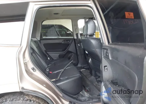 2014 Subaru Forester 2.5I Touring z USA, uszkodzony, nr VIN JF2SJAMCXEH409262